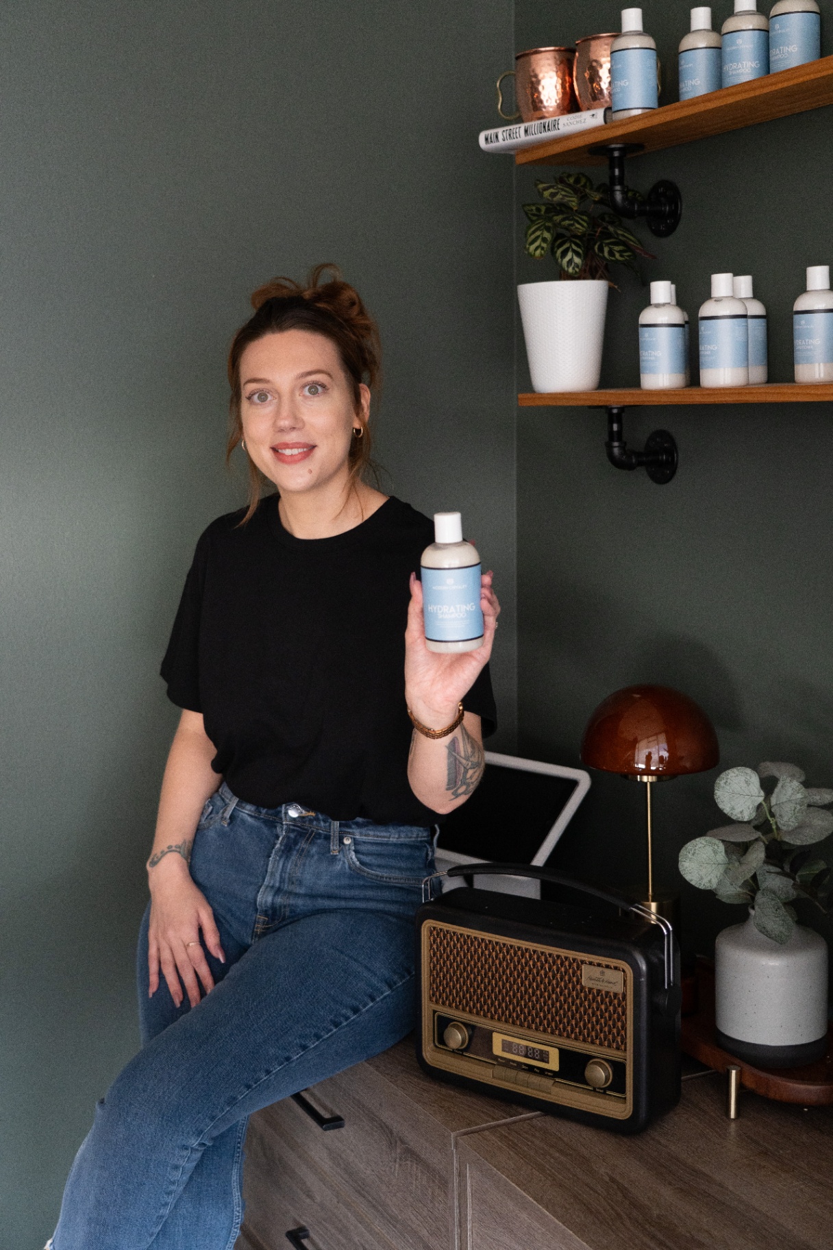 A Modern Chivalry stylist with the shampoo line